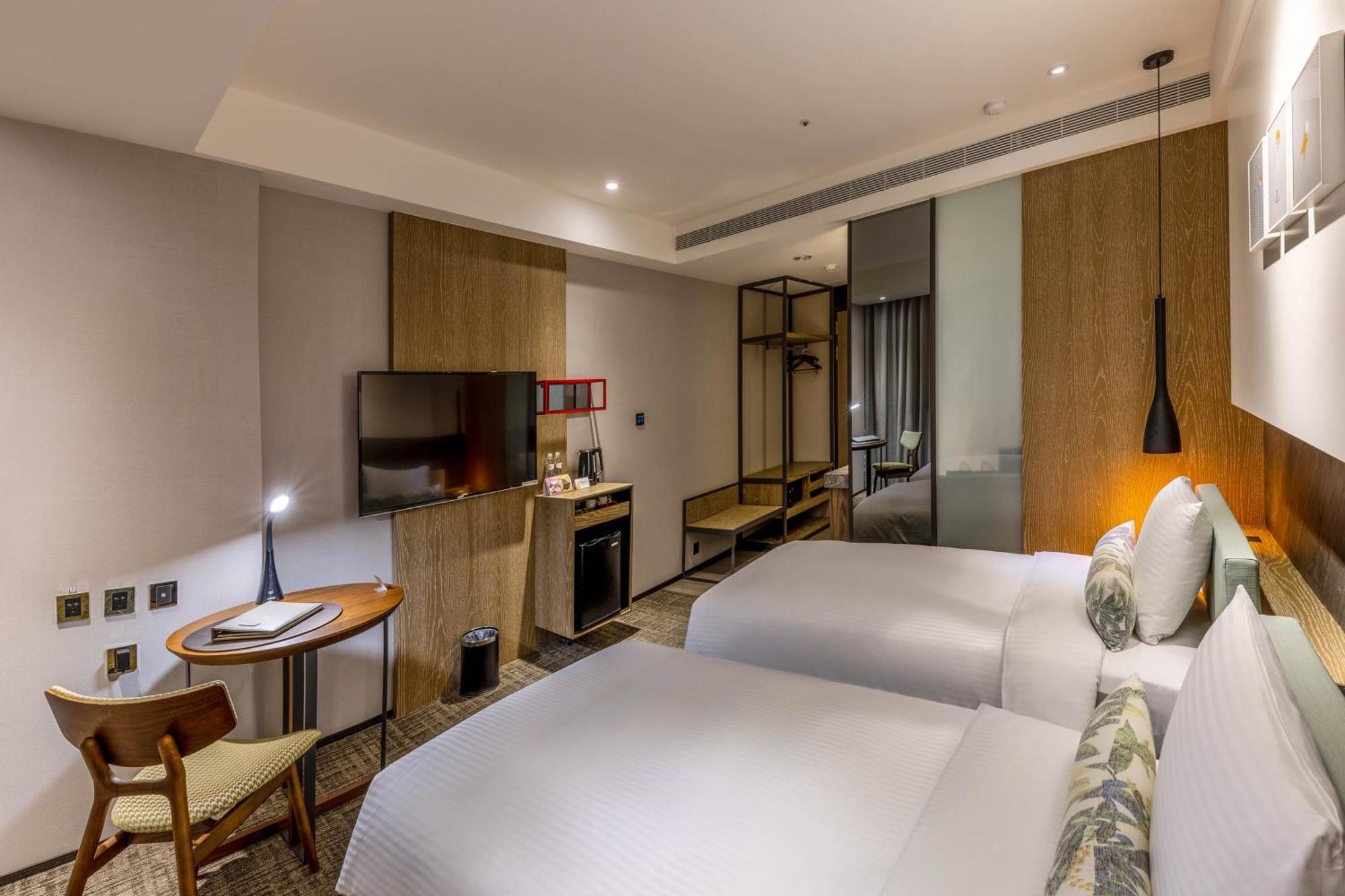 Hsin Hotel Chiayi Værelse billede Deluxe Room