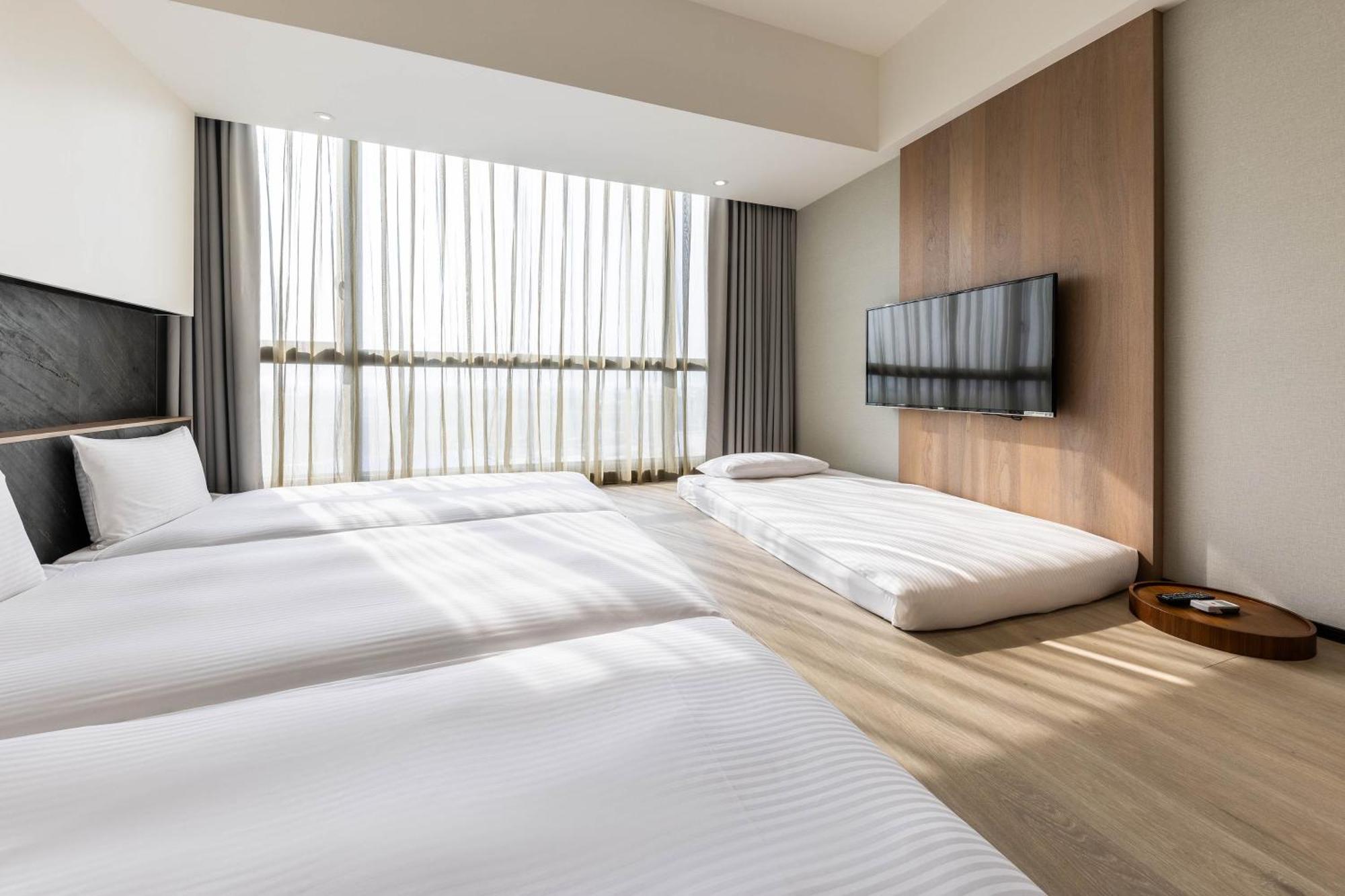 Hsin Hotel Chiayi Værelse billede Deluxe Room
